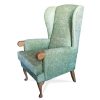 Fully upholstered high back wing chair with Knuckles to aid alighting the chair
